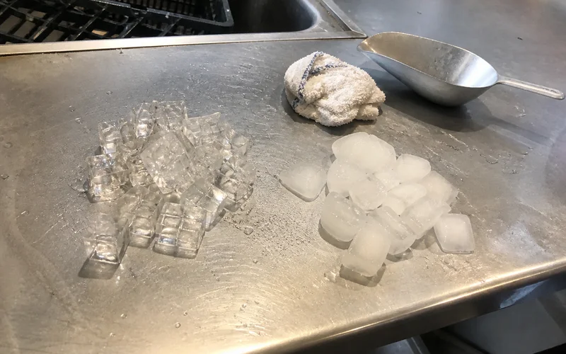 Clear ice cubes compared with cloudy, soft cubes caused by scale