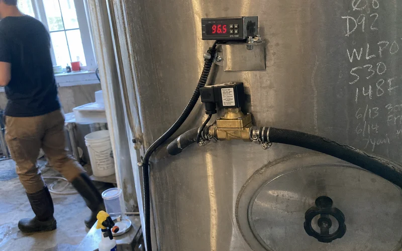 Temperature controller and solenoid valve on a brewery fermentation tank jacket