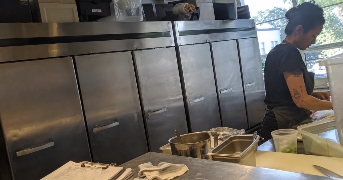 Row of branded commercial refrigeration units serviced under factory warranty
